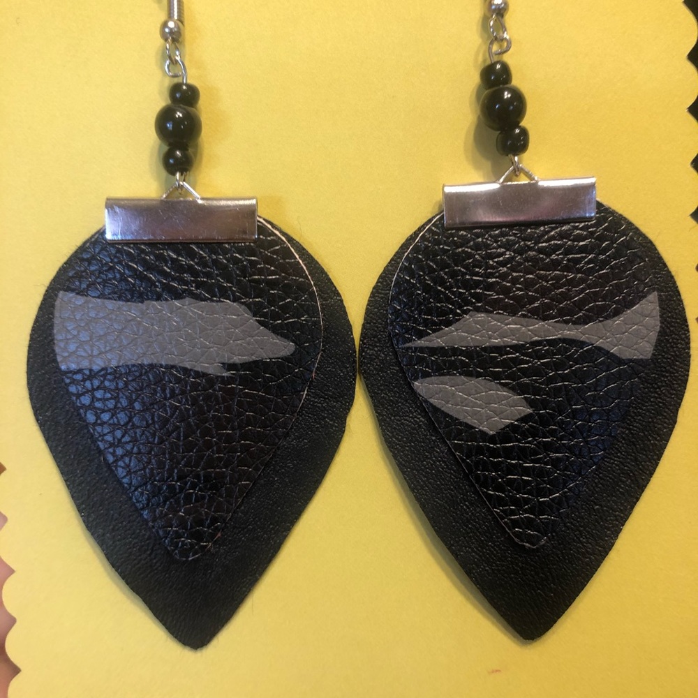 Layered leather earrings with beaded accents